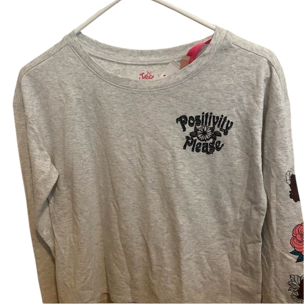 New with tags. Girls long sleeve Justice shirt